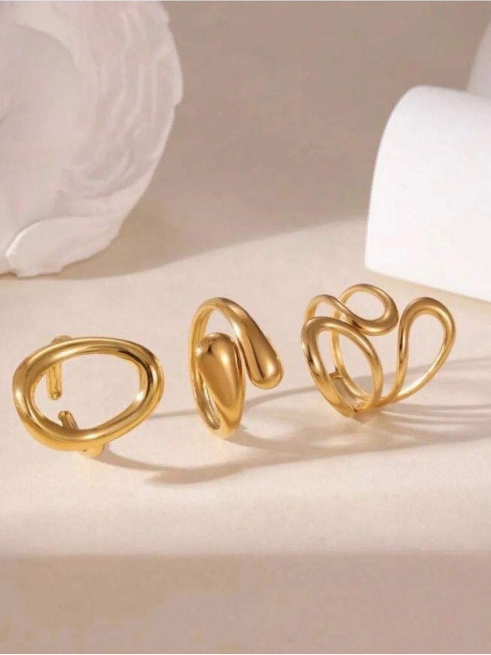 Gold Sculptural Open Ring Trio with Matte Burgundy Nails